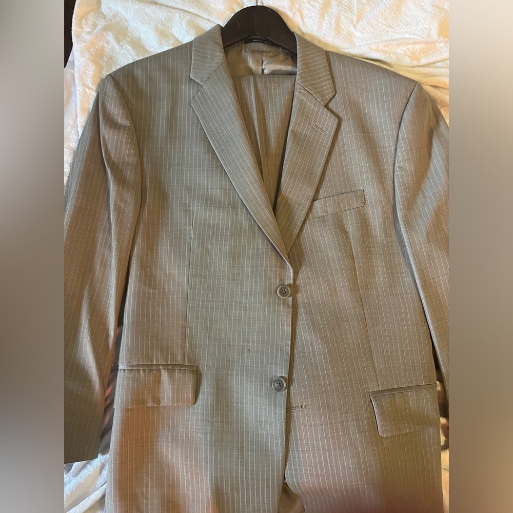 Calvin Klein business suit.